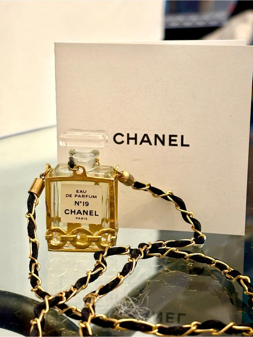 CHANEL Gold and Clear N°19 Perfume Bottle Pendant Necklace